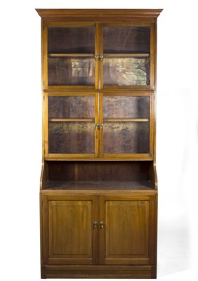 Lot 1003 - An Esavian mahogany sectional bookcase fitted...