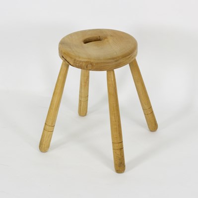 Lot 1009 - A contemporary oak country stool of circular...