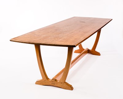 Lot 1016 - A Cotswold school dining table to a design by...