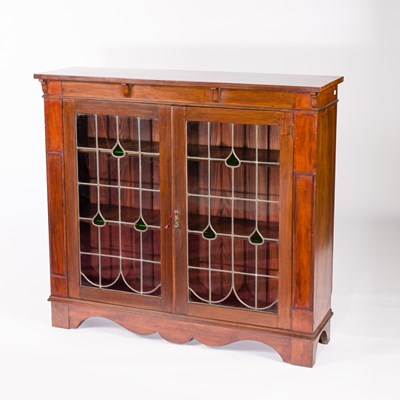 Lot 1046 - An Art Nouveau bookcase, enclosed by leaded...