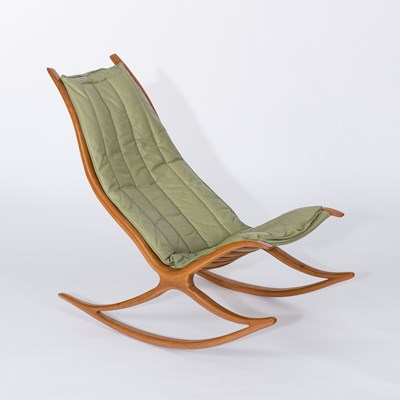 Lot 1048 - Robin Williams; a 'Wishbone' ash rocking chair,...