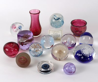 Lot 1060 - A group of various paperweights to include...