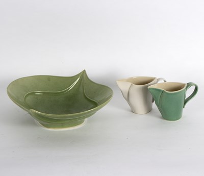 Lot 1075 - A leaf shaped green glazed dish and two...