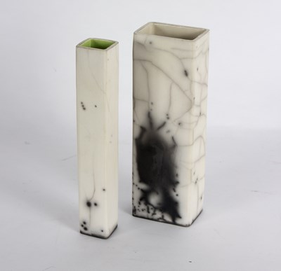 Lot 1079 - Two Raku fired vases, one glazed bright green...