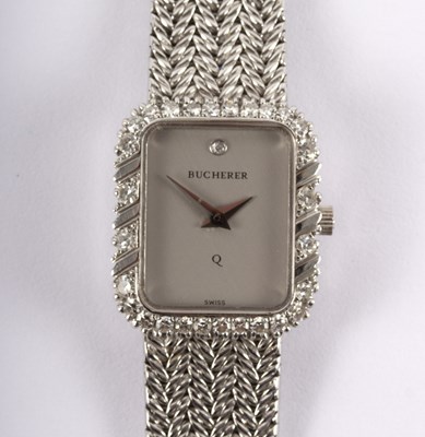 Lot 1111 - A lady's Bucherer wristwatch with diamond set...