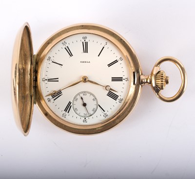 Lot 1115 - An Omega 14k gold hunter pocket watch, the...