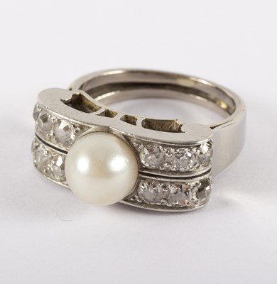 Lot 1142 - A cultured pearl and diamond dress ring, the...