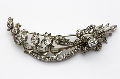 Lot 1146 - A diamond spray brooch designed as an openwork...