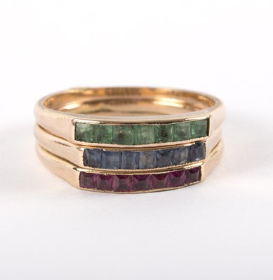 Lot 1150 - An 18ct gold ruby, emerald and sapphire...