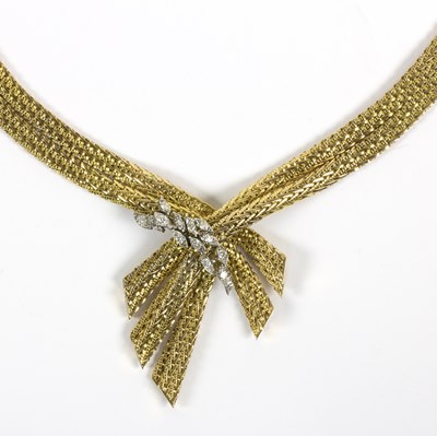 Lot 1151 - An 18ct gold and diamond necklace, the fancy...