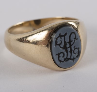 Lot 1160 - A precious yellow metal mounted signet ring...