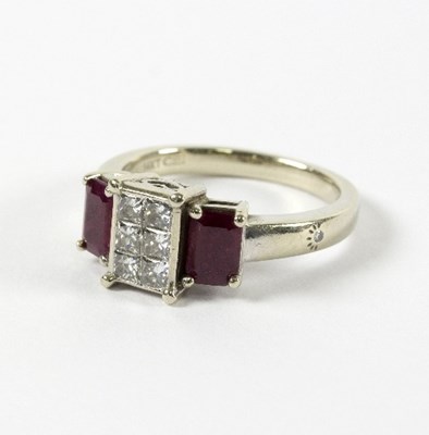 Lot 2 - A ruby and diamond dress ring, the centre set...