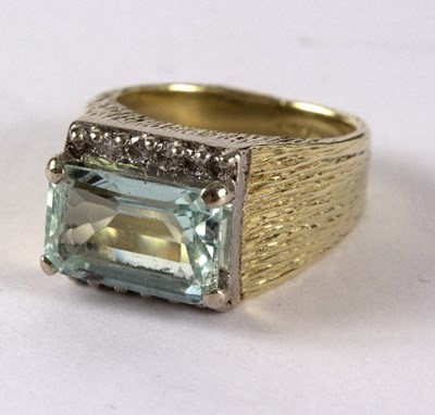 Lot 3 - A diamond and blue topaz dress ring, the...