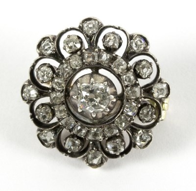 Lot 13 - A diamond flowerhead brooch, the central...