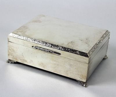 Lot 46 - A silver cigarette box, Birmingham 1975, with...