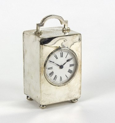 Lot 63 - A silver cased clock, the case Asprey, London...