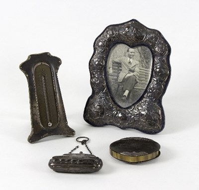 Lot 75 - A Victorian silver photograph frame, 20cm high,...