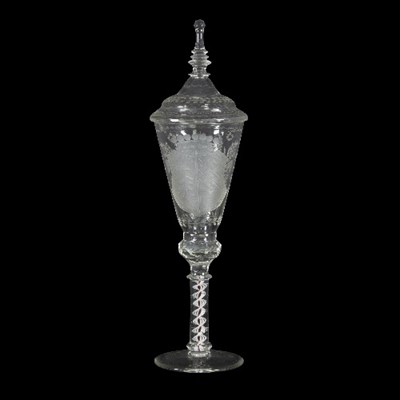 Lot 175 - A German covered glass goblet engraved with a...