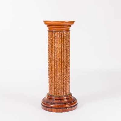 Lot 183 - A majolica pottery jardini?re stand of column...