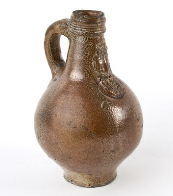 Lot 192 - A Rhenish salt glazed stoneware bellarmine jug...