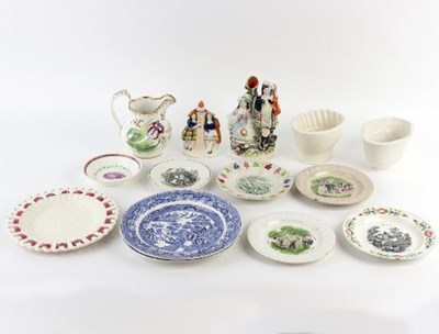 Lot 193 - Two Staffordshire pottery flat back figural...