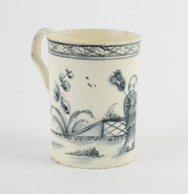 Lot 194 - An English creamware cylindrical mug, painted...