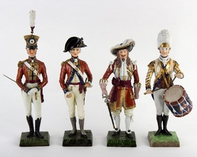 Lot 213 - Four German porcelain figures of guardsmen:...