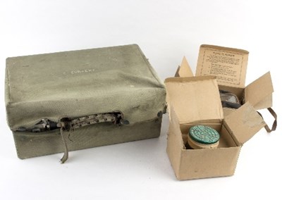 Lot 252 - A black leather suitcase and two boxed gas...