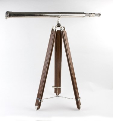 Lot 260 - A chromed telescope on a folding adjustable...