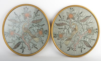 Lot 279 - A pair of 19th Century embroidered oval panels...