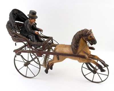 Lot 286 - A Victorian style model carriage with figure...