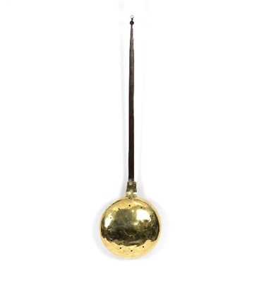 Lot 302 - A late 17th Century brass and iron handled...