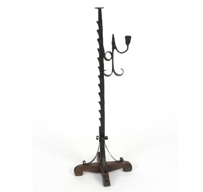 Lot 306 - An iron floor standing adjustable rush light...