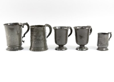 Lot 310 - A 19th Century pewter mug, 15cm high, a pair...