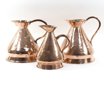 Lot 313 - Two West Country copper one gallon measures,...