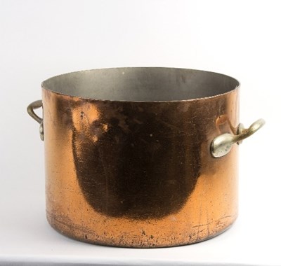 Lot 335 - A large copper twin-handled cauldron with twin...