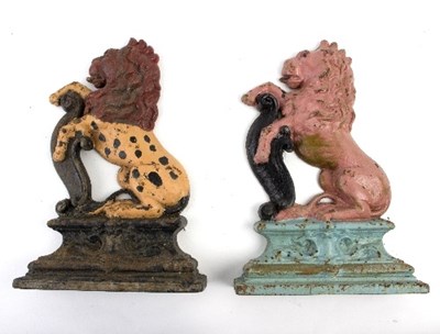 Lot 344 - A pair of painted cast iron door stops, each...