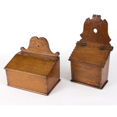 Lot 371 - An oak slope lid wall box, 28cm wide and...