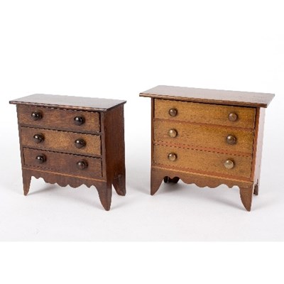 Lot 373 - Two miniature mahogany chests, each of three...