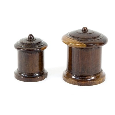 Lot 383 - A lignum vitae string barrel, 12cm high and...