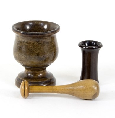 Lot 385 - A turned wooden mortar, a pestle and a small...