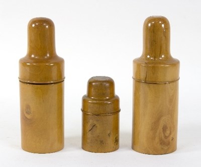 Lot 386 - Three boxwood bottle carriers