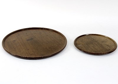 Lot 388 - A circular mahogany tray, 40cm diameter and a...