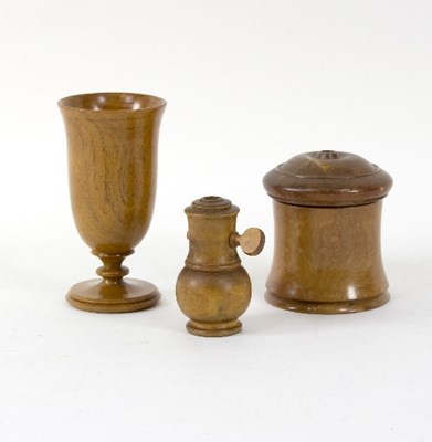 Lot 390 - A boxwood goblet, 15cm high, a box and cover,...