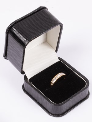 Lot 50 - An 18ct yellow gold and diamond half-eternity ring