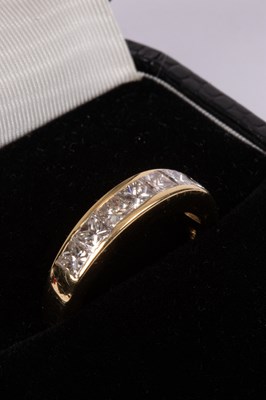 Lot 50 - An 18ct yellow gold and diamond half-eternity ring
