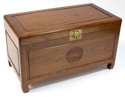 Lot 915 - A modern Chinese carved chest with hinged...