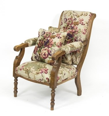 Lot 917 - A walnut framed open armchair with reeded and...