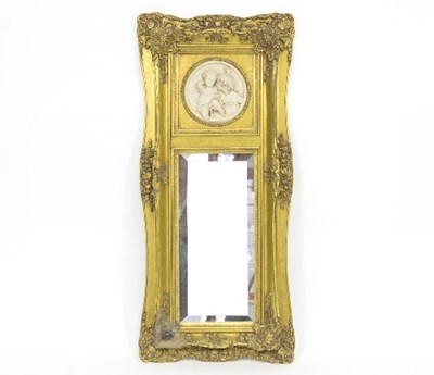 Lot 919 - A gilt framed wall mirror with foliate gilt...