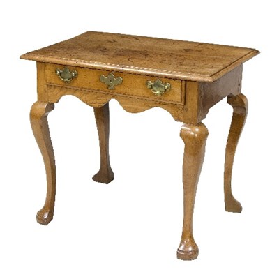 Lot 941 - A George I solid walnut one-drawer side table...